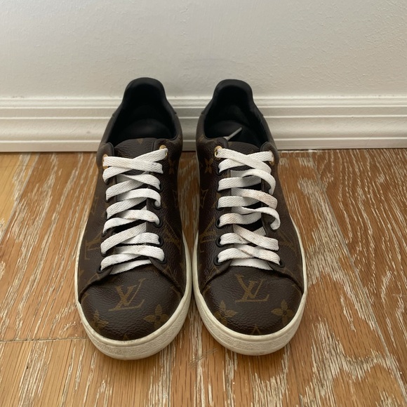 Worn Louis Vuitton leather sneakers - Picture 1 of 4